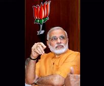 Modi meets upset Advani takes charge of new job