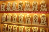 Gold futures up at Rs 28,033 per 10 gm